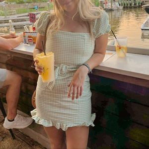 Green gingham mini dress